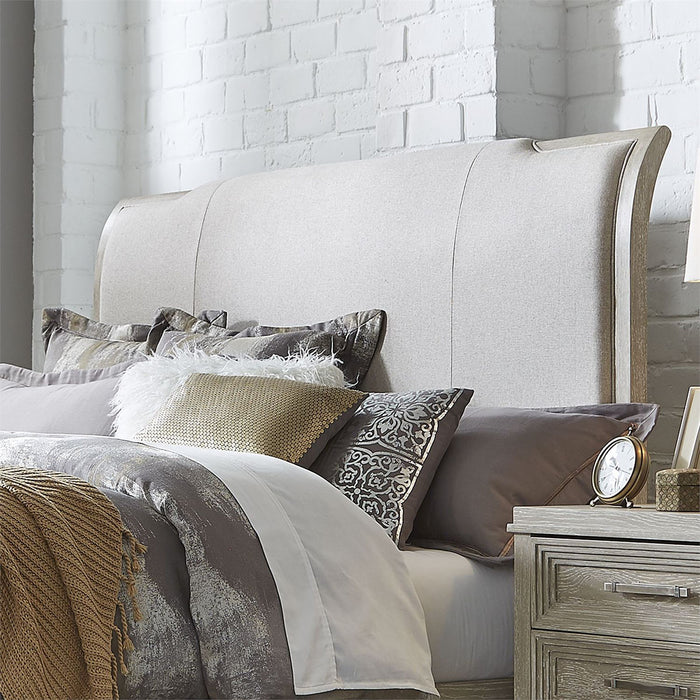 Liberty Furniture Belmar Cal King Upholstered Sleigh Bed in Washed Taupe and Silver Champagne 902-BR-KUB