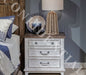 Liberty Furniture River Place 3 Drawer Nightstand with Charging Station in Riverstone White and Tobacco image